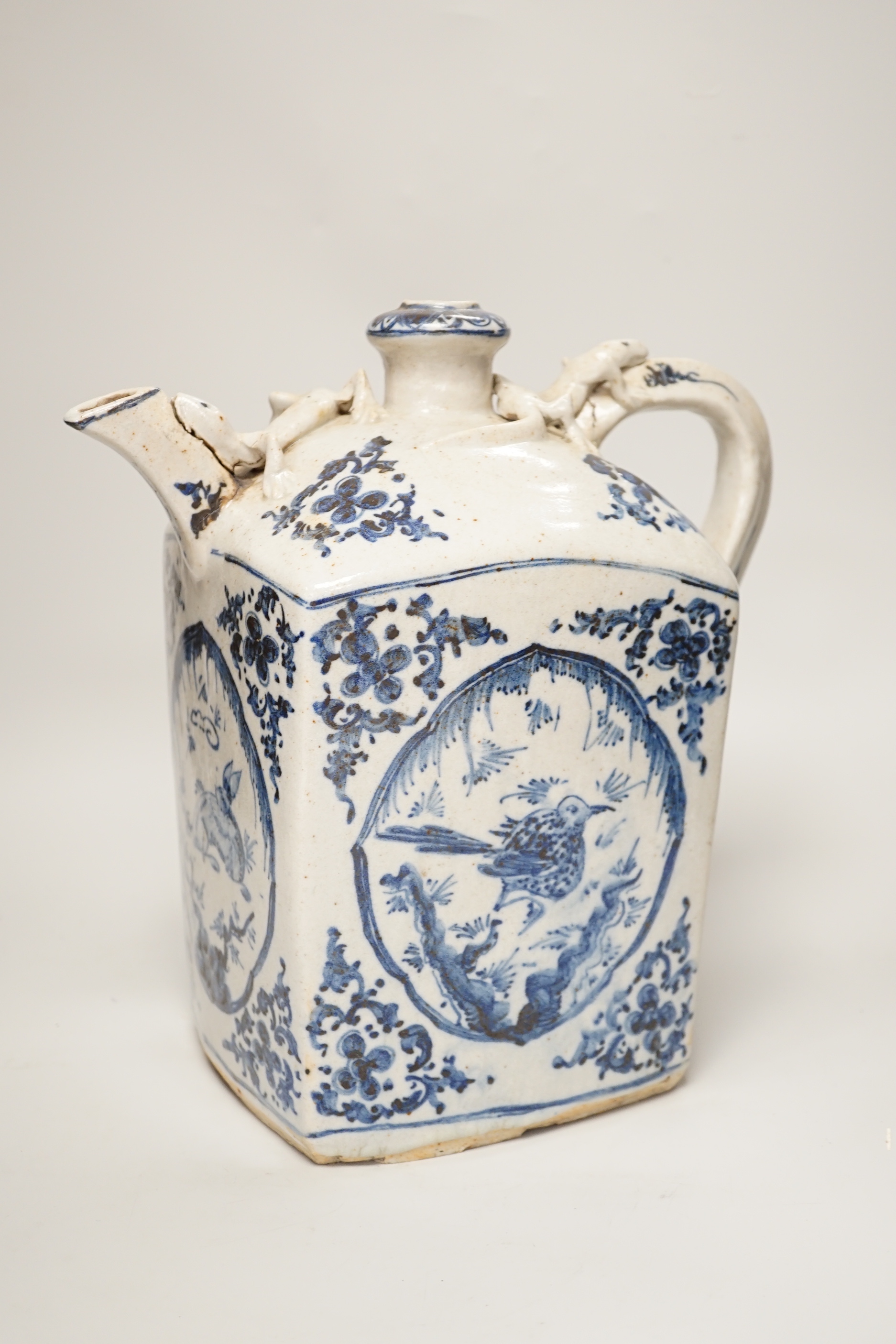 A blue and white Chinese pottery teapot, 31cm high